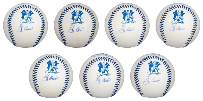 Lot Of (7) Yogi Berra Signed Joe DiMaggio Commemorative Baseballs (PSA/DNA)
